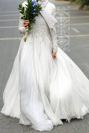 Sure, cultural differences are the source of many problems these days, but there's another side of the coin here, because they're also the source of some of the most interesting traditions. Delphinium Gown Wedding Dress Inspiration Muslim Wedding Dresses Muslim Wedding Gown