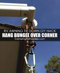 Genius Rv Awning Tie Down Hack How To Diy Video With 5 Simple Supplies Rv Awning Rv Rv Camping