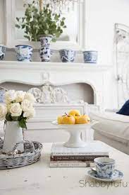 The beautiful beveled table top paired with carved turned legs offers the love this coffee table! Behind The Scenes Of Coffee Table Styling 3 Ways Shabbyfufu Com