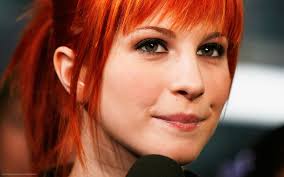 It is a light brown with warm orange and golden undertones. Wallpaper Face Redhead Model Portrait Green Eyes Singer Black Hair Hayley Williams Mouth Nose Person Head Singing Paramore Girl Beauty Smile Eye Lady Blond Hairstyle 1920x1200 Px Brown Hair Human Hair