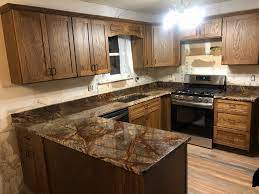 Soapstone got its name from its soft/soapy look due to the presence of talc in the stone. Project Profile Rainforest Brown Marble Kitchen Countertops In Dayton Tn Granite Countertops In Chattanooga Tennessee