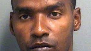 Man charged in murder returned to Palm Beach County; suspect was grabbed at  strip club, shot, burned