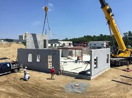 Depending on the design features of the customer's project, it is possible to organize technological holes and doorways of the required sizes in the sections of elevator shafts. Precast Concrete Office Building Npca