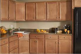 A magnificent cherry stained birch cabinet. Builders Mark Cabinets From Wolf Home Products In Nutmeg Wolf Home Products