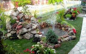 Relaxant.pietrele de rau mari ce sunt folosite si in tratamentul cu pietre hot stone massage stau armonios pe platoul rotund din interior,fantani arteziene gradina,modele fantani arteziene,fantani arteziene pret,fantani.fantani arteziene din piatra, fantani arteziene. Amenajari Exterior Piatra De Rau