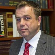 HIV Victim Says Greek Exec Fired Him