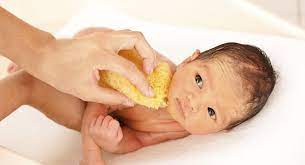 Baby bath ears underwater / topi mandi+ disney children's head hat baby shampoo. How To Bathe A Newborn Babycenter