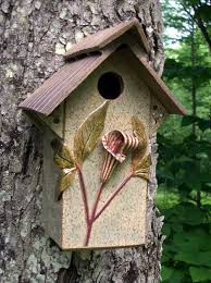 Birds That Make Mud Nests On Houses Abby Dreyer A Member Of Mud Studio In Middlesex Is The Maker Of Amazing Ceramic Birdhouses Shown Here Is A Handbu Ceramic Birdhouse Ceramic Birds Bird Houses