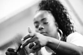 Kalamazoo Eastside resident opens positive salon that models a way up the  ladder