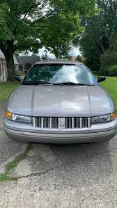 Image result for Medium Driftwood 1995 Chrysler