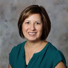 Just a few of the San Antonio Metroplotina Health District's Epidemiology  Team supporting college day by wearing their favorite college t-shirt!