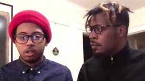 Young barbers at 12 Pell help carry