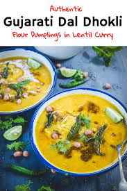 Gujarati Dal Dhokli Recipe Is A Spicy Sweet One Pot Meal Prepared By Simmering Whole Wheat Flour Bi Gujarati Recipes Indian Vegetarian Dishes Indian Cooking