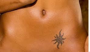 Larger of these can wrap around your side or even onto your lower back. Small Sun Tattoo On Stomach