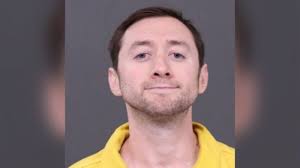 Man arrested after video post showed severed head of his father, police  say, amid political rant