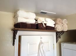 Tiny Home Solutions Towel Shelf Above Bathroom Door Tinyhomestoragesolutions Bathroom Cleaning Hacks Tiny Closet Organization No Closet Solutions