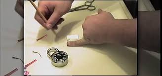 Get a paperclip get a paperclip or safety pin and bend it straight. How To Pick A Combination Lock Using A Soda Can Tools Equipment Wonderhowto