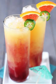 Tequila cocktails can take on a variety of flavors. Spicy Tequila Sunrise Gimme Some Oven Recipe Tequila Sunrise Food Recipes