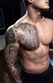 In fact, some men prefer a half chest tattoo that extends all the way to the shoulder and upper arm. 100 Nice Chest Tattoo Ideas Cuded Tribal Tattoos For Men Cool Tribal Tattoos Mens Shoulder Tattoo