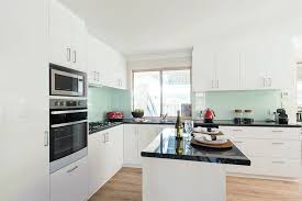 Laminate Floors Godfrey Hirst Get The Look With Belle Laminate Floors In Pinnacle Oak Flooring Options Durable Durable Flooring Kitchen Flooring