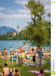 A sandy beach at a seaside resort. Les Gens Appreciant L Ete Au Lac De Plage En Slovenie Photographie Editorial Image Du Outdoors Downtown 73370137