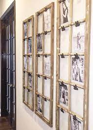 10 Stylish And Creative Ways To Display Family Photos Family Wall Decor Family Pictures On Wall Display Family Photos