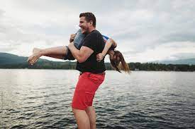 We did not find results for: Young Playful Couple Together On Dock At Lake Man Picking Up Woman By Rob And Julia Campbell
