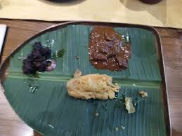 Ladle beef curry over rice on plates. Pazham Pori And Beef Curry And Fry Picture Of Kappa Chakka Kandhari Bengaluru Tripadvisor