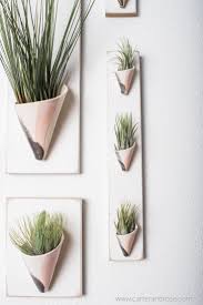 These Hanging Ceramic Wall Planters In Blush And Gray Glaze Add A Touch Of Greenery To Any Modern Home An Ceramic Wall Planters Ceramic Wall Decor Wall Planter