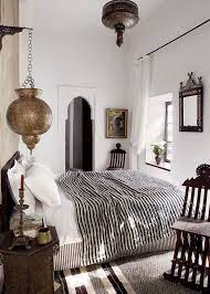 The area rug and blankets are of typical moroccan style and further add to the decor. 19 Moroccan Bedroom Decoration Ideas Moroccan Decor Bedroom Moroccan Inspired Bedroom Moroccan Style Bedroom