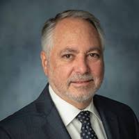 Hon. David Elliot (Ret.)