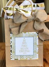 Wrap the ribbon around the bag, down the center of the washi tape. How To Decorate Gift Bags Ideas Baer Design Studio