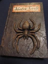 Do you know how to spell your name? My Shadow Craft Spell Book Using Thrift Store Book Plastic Spider Tissue Paper Mod Podge Painting Shadow Craft Spell Book Plastic Spiders