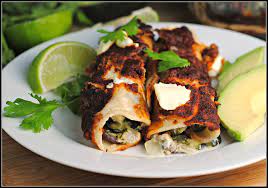I came up with this spicy chicken enchiladas recipe shortly after i got married. America Test Kitchen Roasted Poblano Enchiladas Poblano Sour Cream Chicken Enchiladas Vintage Kitty And Test Cook Erin Mcmurrer Makes The Perfect Roasted Poblano And Black Bean Enchiladas For Design Building