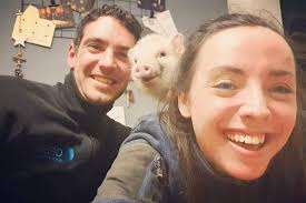 This couple's wedding had a real pig for a bridesmaid