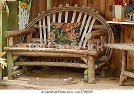 Outdoor furniture made from tree branches. Still Life Of An Old Bench Made Of Tree Branches Canstock