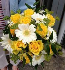 Lovely Wedding Bouquet Showcasing White Gerbera Daisies Yellow Roses Green Bupleurum Green Foliage Yellow Wedding Bouquet Wedding Flowers Wedding Bouquets