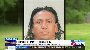 Murder suspect arrested after man stabbed, left lying in field, police say