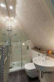 Attic bathrooms with sloping walls. Bathroom With Slanted Ceiling Small Attic Bathroom Tiny House Bathroom Attic Bathroom