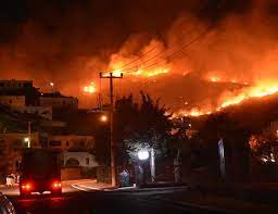 Firefighters are tackling 17 fires in the region, the largest in manavgat, anamur and adana, in a helicopter flies over mugla in turkey's marmaris district on thursday as efforts to extinguish forest. K3owjapnazjham