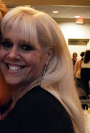 Can someone edit my hair in this photo to make it look like all my hair is  in front of my shoulders?