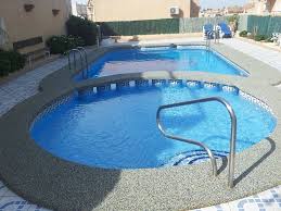 Smooth Tactile Yet Slip Resistant Swimming Pool Surround Created Using Epdm Granulate From Miroad Rubber Wetpour Insta Backyard Makeover Pool Swimming Pools