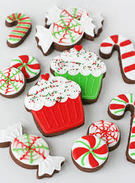 Christmas cookies or christmas biscuits are traditionally sugar cookies or biscuits (though other flavours may be used based on family traditions and individual preferences) cut into various shapes related to christmas. Decorated Christmas Cookies Glorious Treats