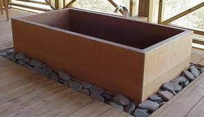 Since all the actual washing is done outside the tub, the whole bathroom is built like a big shower stall, with drainage planes and a floor drain. How To Build A Japanese Soaking Tub Hunker Japanese Soaking Tubs Japanese Bathroom Design Japanese Soaking Tub