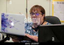 Austin, Texas, USA. 6th Oct, 2020. Under the careful watch of third grade  teacher JEANINE DOYLE and with plenty of PPE ready, in-person learning  takes off once again during the second day
