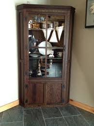 Some corner hutches even have glass racks for keeping wine glasses on display. Custom Corner Display Cabinet By Owryen Interiors And Woodworking Custommade Com