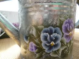 Having recently switched from having a small backyard with a hose to an apartment with a balcony and a container. Watering Can Planters And Garden Art Recycle Your Watering Cans