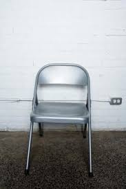 How To Make Super Cute Seat Cushions For Folding Chairs Hunker Metal Folding Chairs Folding Chair Makeover Folding Chair