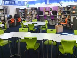 Heart Of The School Library Furniture School School Library Design Library Seating