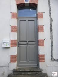 Le design de la porte d'entrée chrystal se décline sur la porte de garage (fabrication novoferm habitat). Porte Realisations Menuiserie Gastal Artisan Menuisier A Villeneuve Sur Lot